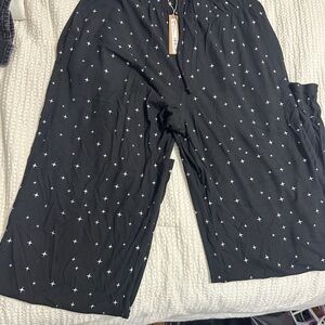 SKIMS Black Pants with White Star Design